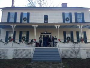 The front of Pond Spring decorated with garlands.