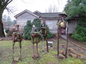 Metal sculptures beside the Handy birthplace