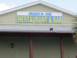 Beach House front sign -- 1154 West Beach Boulevard in Gulf Shores, AL.