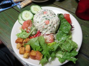 Housemade tuna salad on a bed of greens with fresh veggies and croutons.