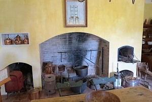 Fireplace in the separate kitchen cabin.