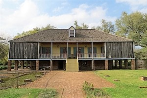 /the back side of the Laura Plantation mansion.