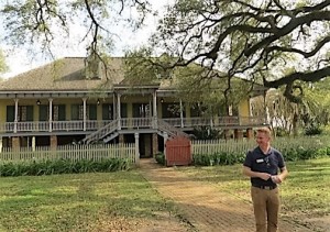 Joseph Dunn in front of Laura Plantation.