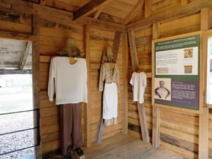 A display about the typical clothing of slaves.