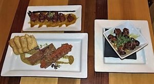 3 different tapas - duck poppers, hogshead cheese, and stuffed dates.