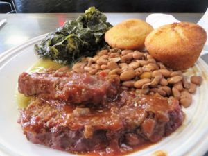 Meat loaf, collards, pinto beans and cornbread. Mighty good!
