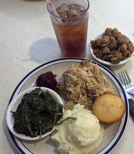 Chicken and dressing, turnip greens, mashed potatoes, fried okra, cornbread and good sweet tea!