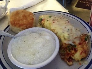 3-egg omelette topped with pepper jack cheese, biscuit and grits.