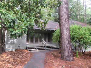 Exterior of a Mountain Creek Villa which blends in to the wooded environment.