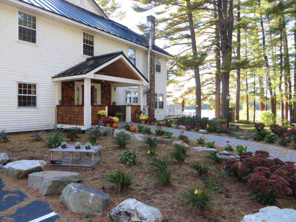 Wolf Cove Inn with Tripp Lake in the distance. Poland, Maine