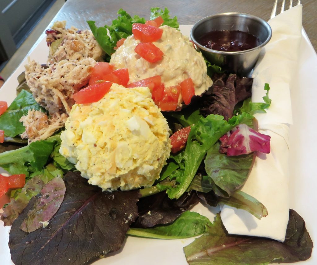 Salad trio with chicken, tuna and egg salad.