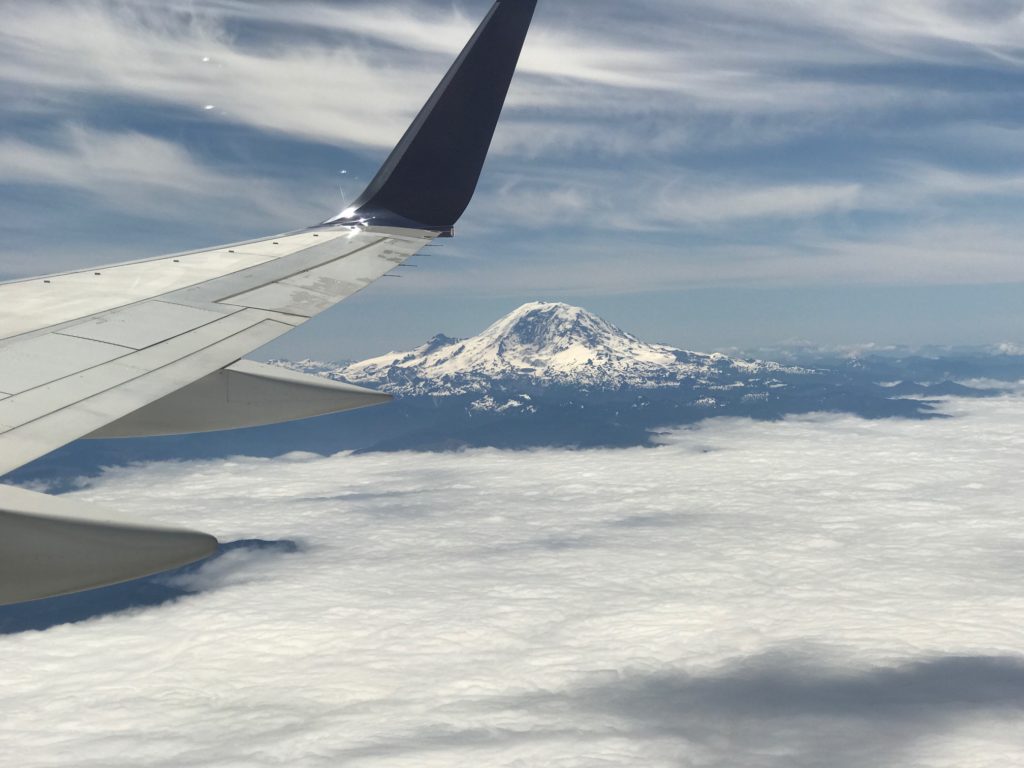 Mount Rainier looming above the clouds.